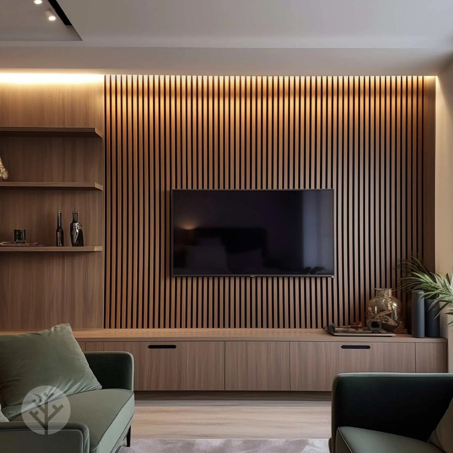 Modern living room with wooden slat wall, TV, and shelves.