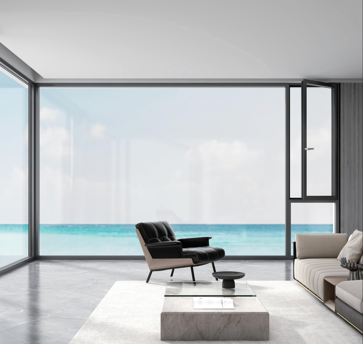 Modern living room with a large window view of the ocean.