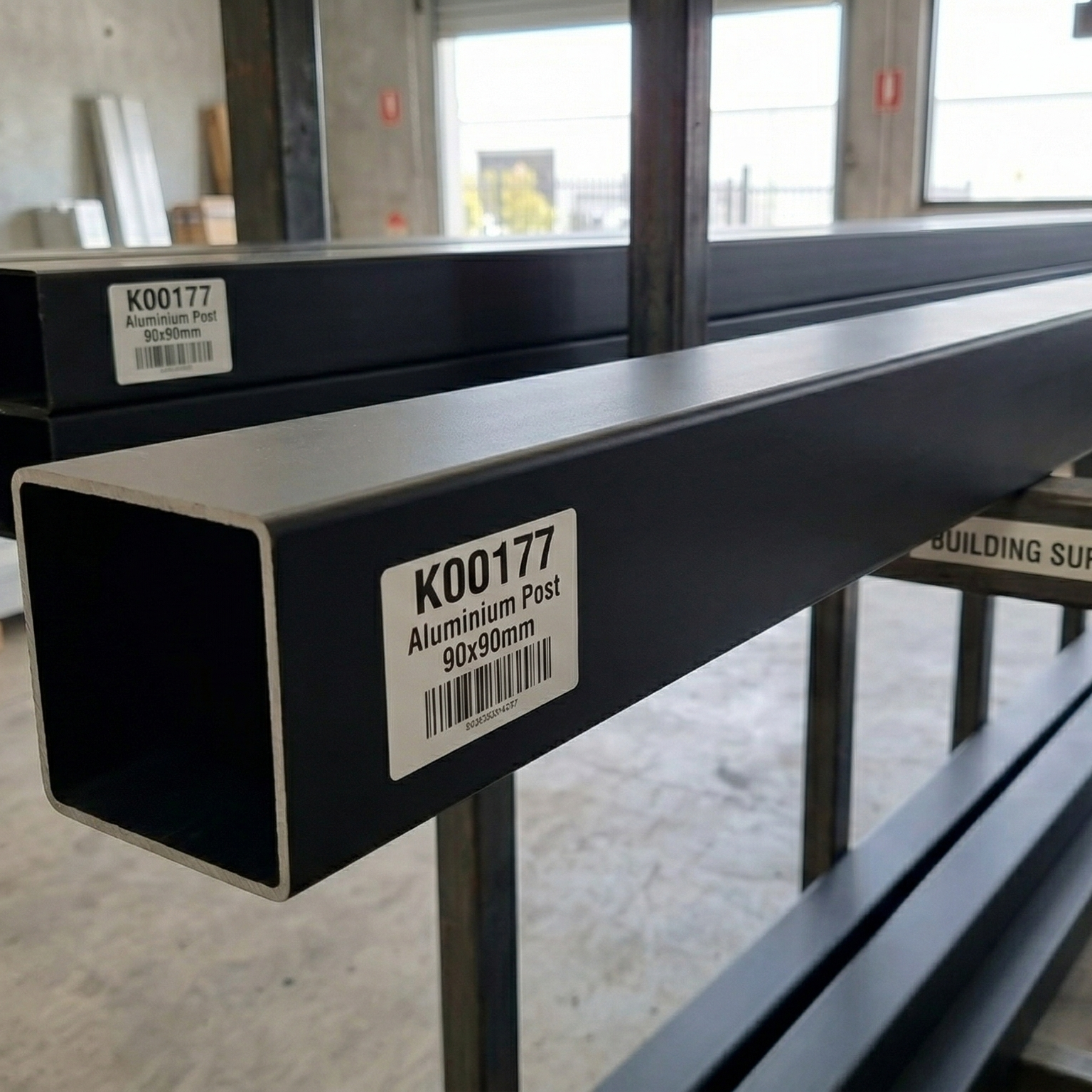Metal profiles with labels on a workshop floor