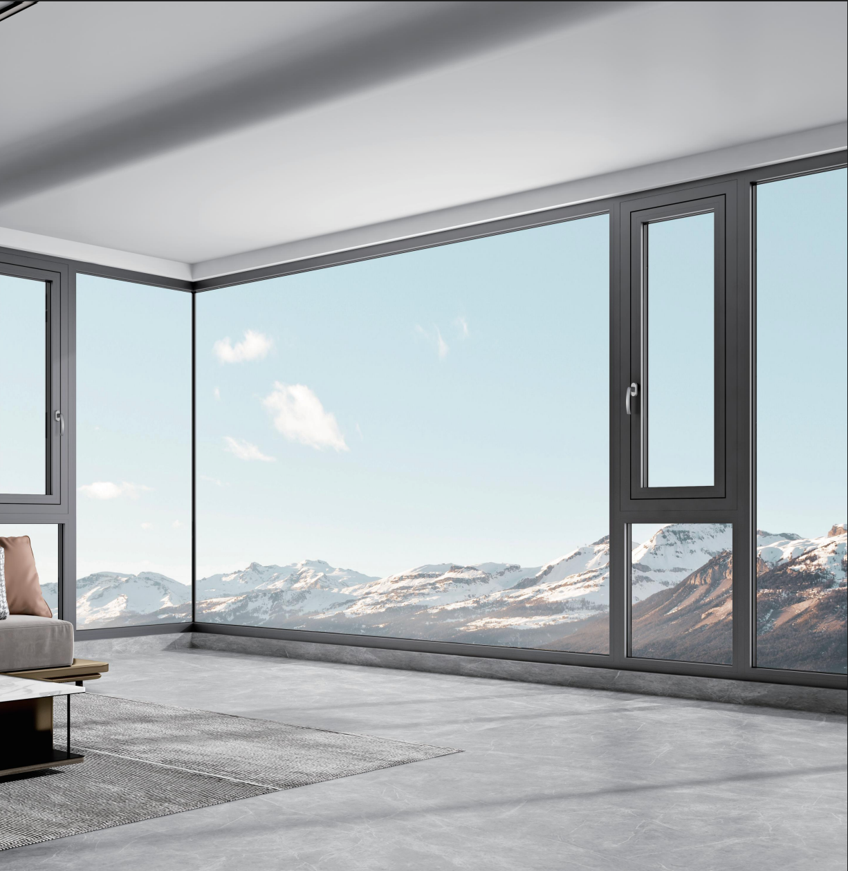 Modern living room with large glass windows offering a view of mountains.