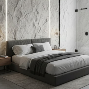 Modern bedroom with a bed against a textured wall.